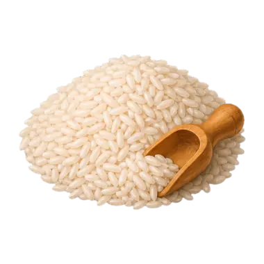 Balle anti-stress au riz : une garniture granuleuse, un tas de riz blanc et sa pelle en bois